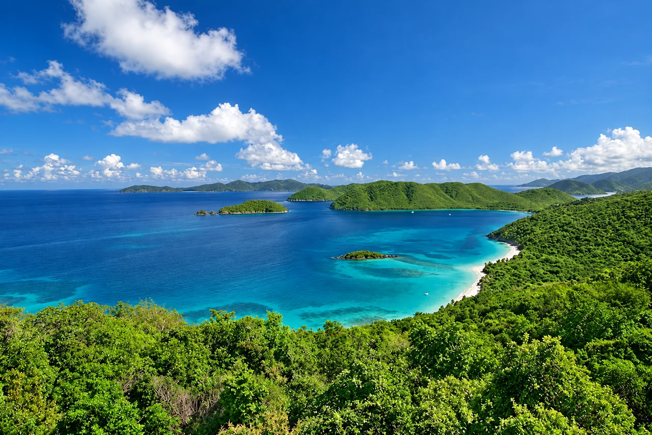 A panoramic view of forested islands and turquoise bays in St. John
