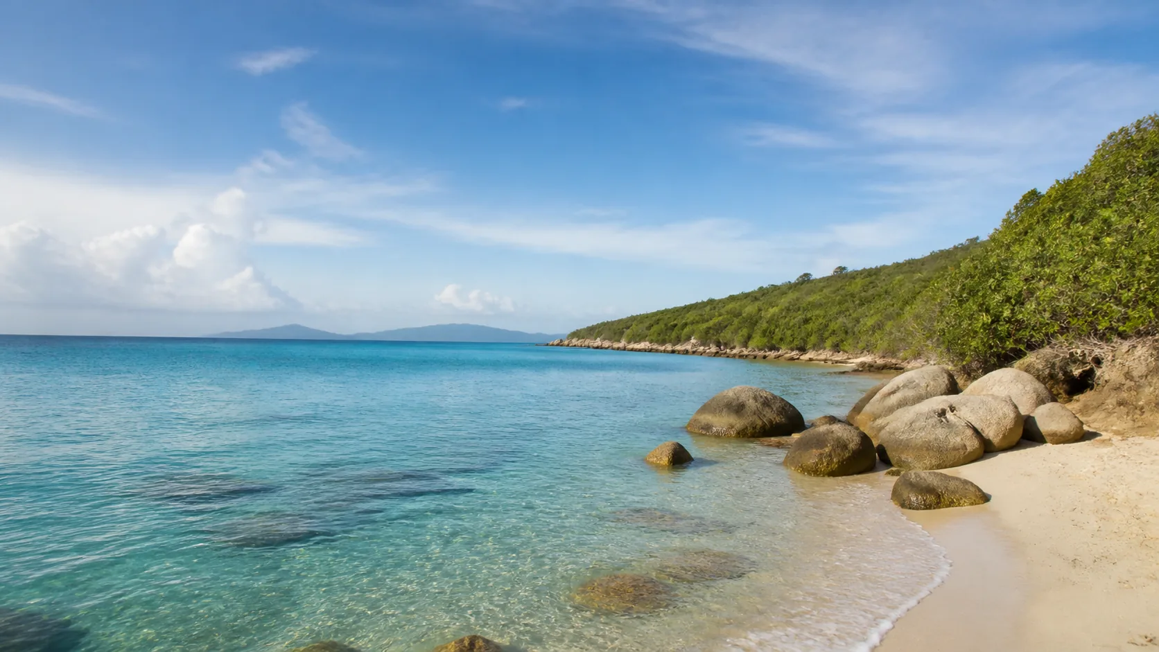 AI-generated illustration: Virgin Gorda-inspired pale cove with naturally rounded granite boulders.